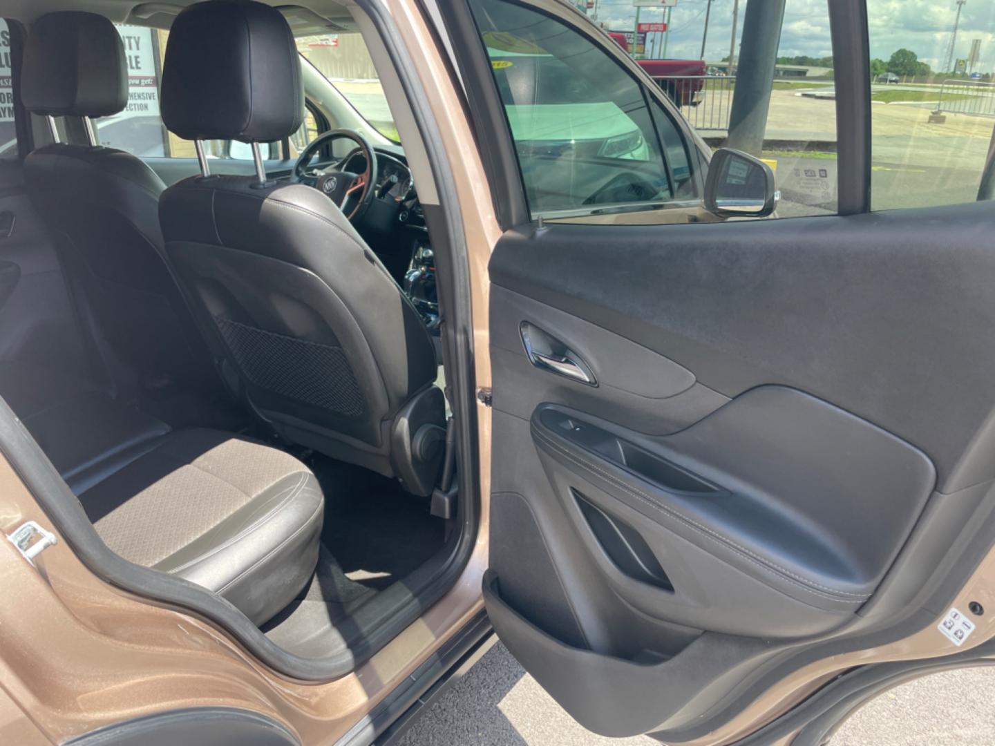 2019 Brown Buick Encore (KL4CJASB6KB) with an 4-Cyl, ECOTEC, Turbo, 1.4 Liter engine, Automatic, 6-Spd w/Overdrive and Shift Control transmission, located at 8008 Warden Rd, Sherwood, AR, 72120, (501) 801-6100, 34.830078, -92.186684 - Photo#9